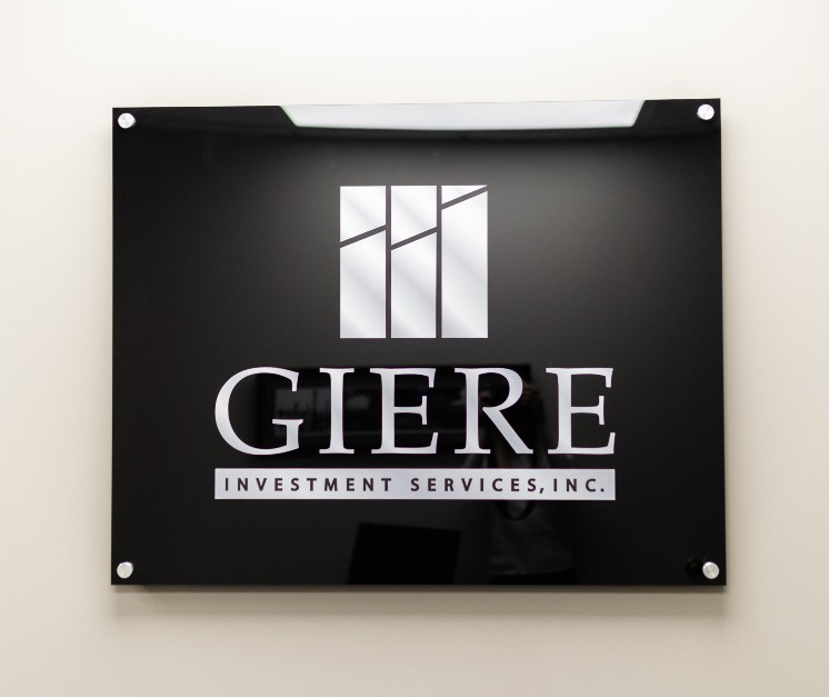 office sign of Gyre Investment Services, INC. on the wall